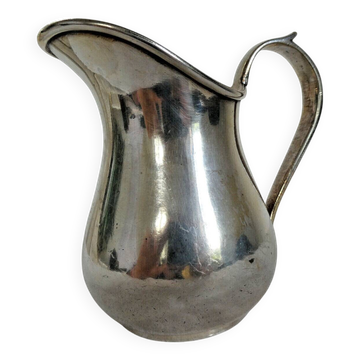 Silver metal milk jug