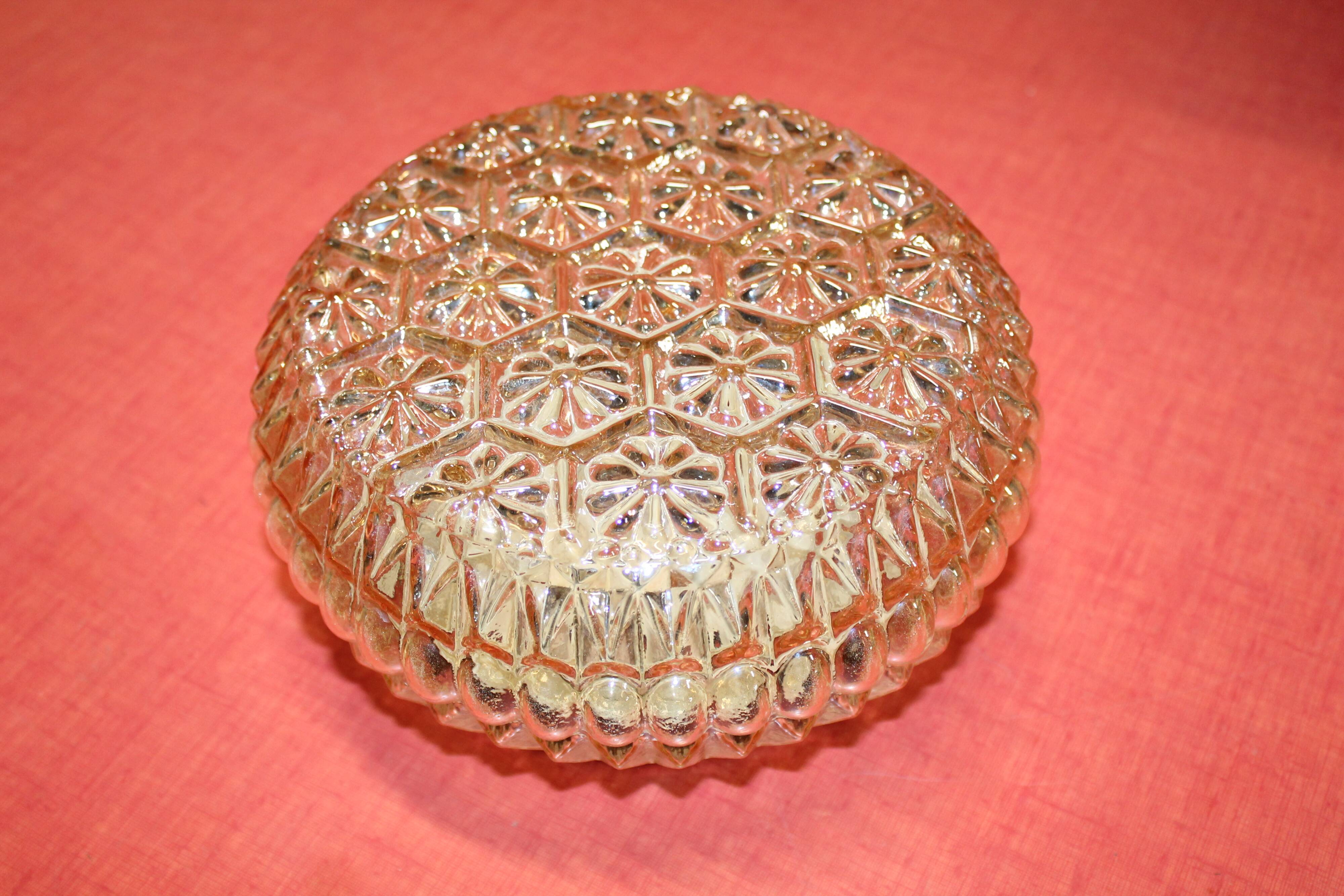 Moulded glass wall sconce