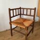 Corner armchair in beaded wood straw