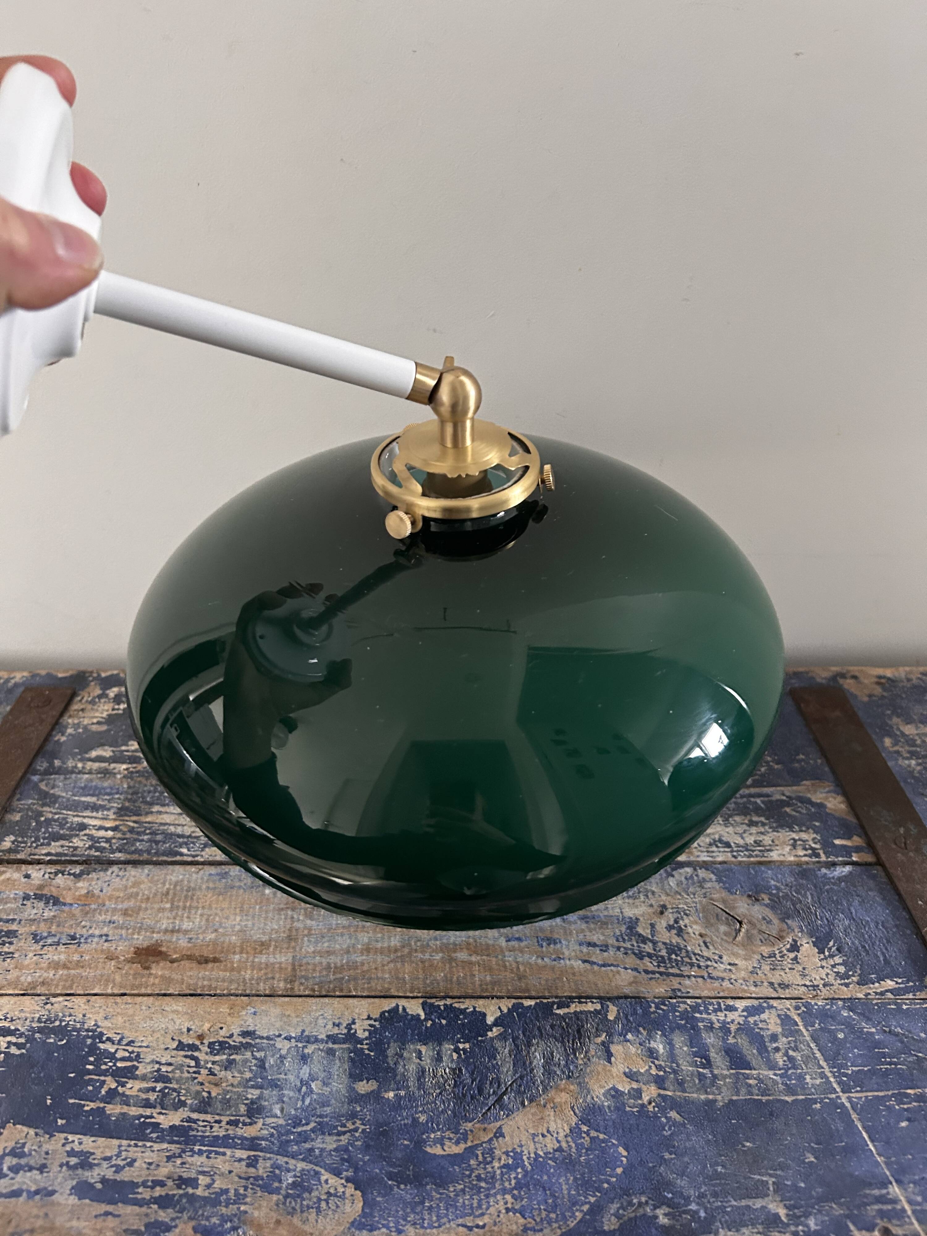 Tilting wall light in green opaline