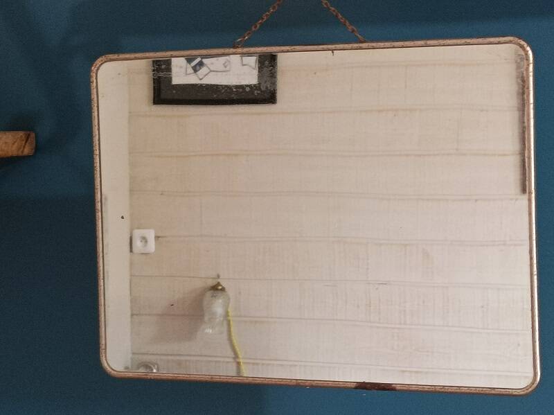 Barber mirror patinated metal surround