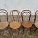 Set of 10 bentwood bistro chairs with cane seat.
