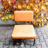 Modernist leatherette armchair