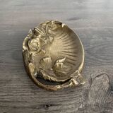 Art Nouveau pocket emptier