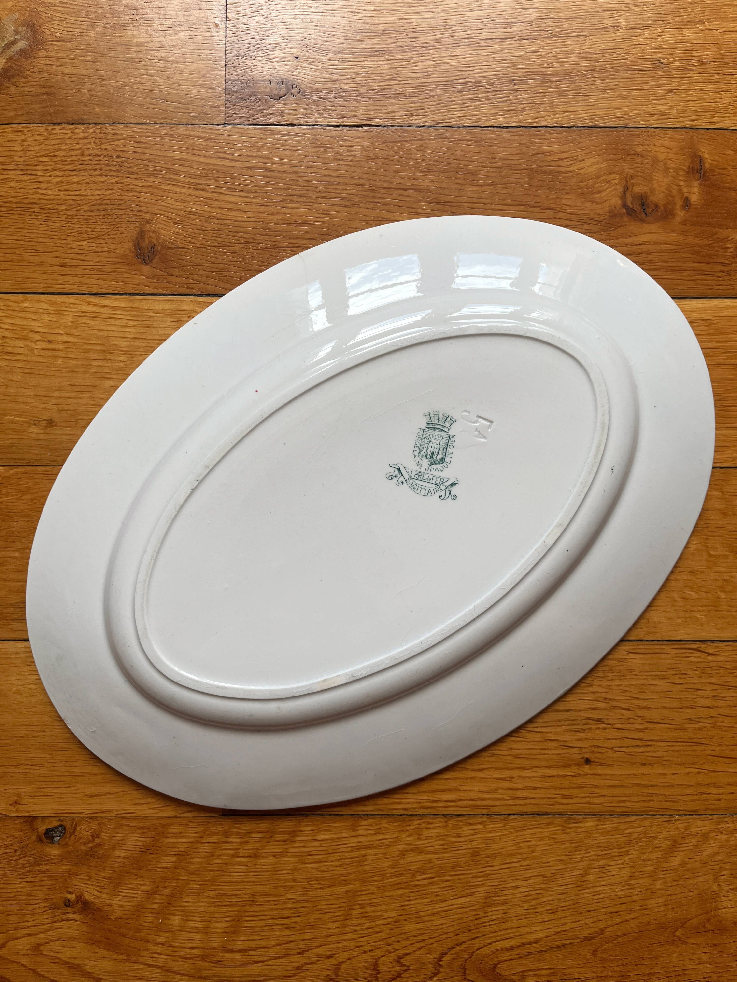 Opaque "Sagittaires" ironstone oval dish from Gien