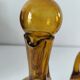 Duo of blown glass carafes – Biot signed – Bubbled amber glass