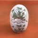 Egg-shaped ceramic salt and pepper shakers with Couslip decor (primrose)