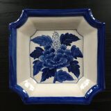 Blue floral decor pocket emptier