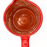 Bright red ceramic pitcher