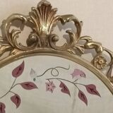 Gilded bronze mirror and screen-printed glass with flower motif