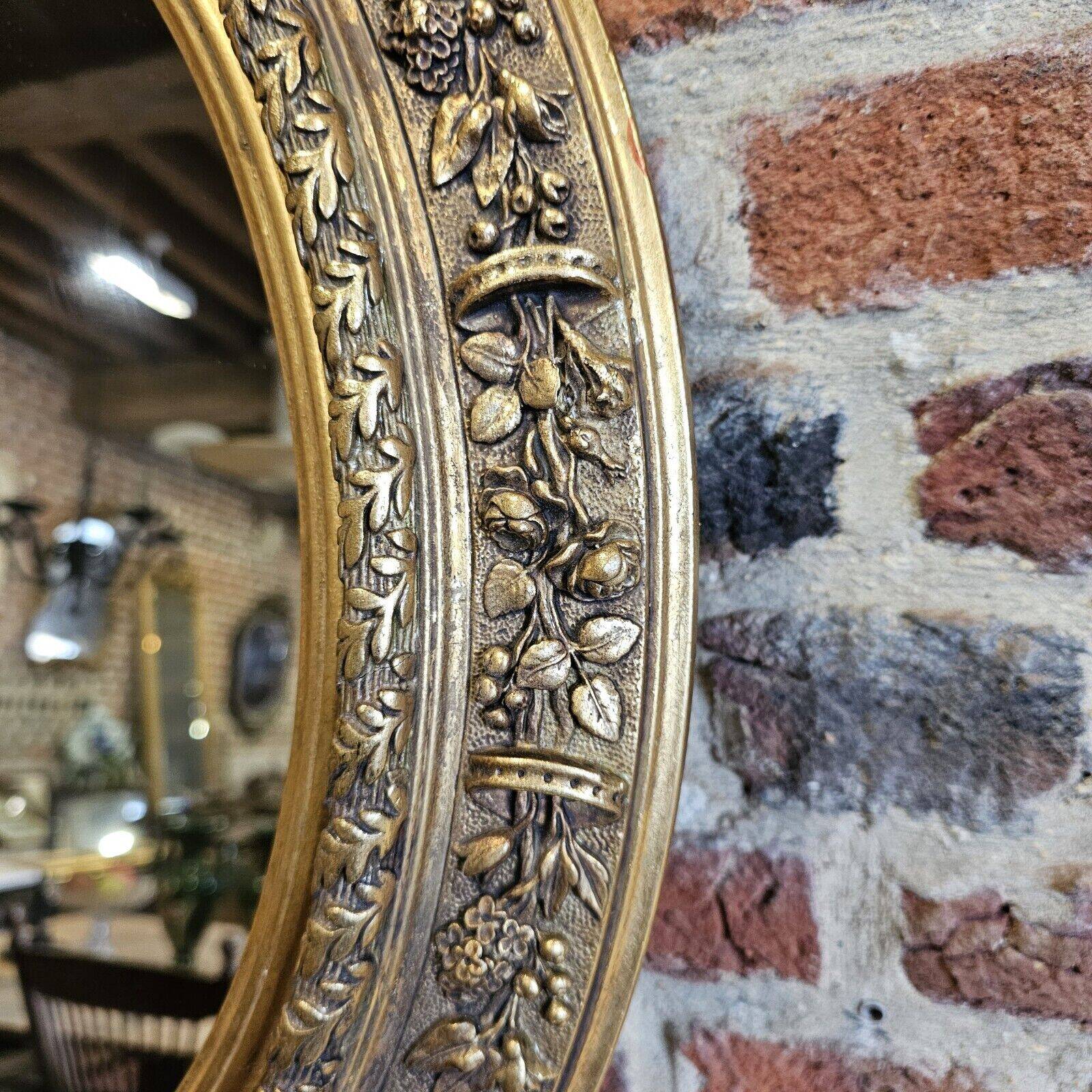 Small oval mirror
