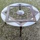 Outdoor iron table with yin yang decoration