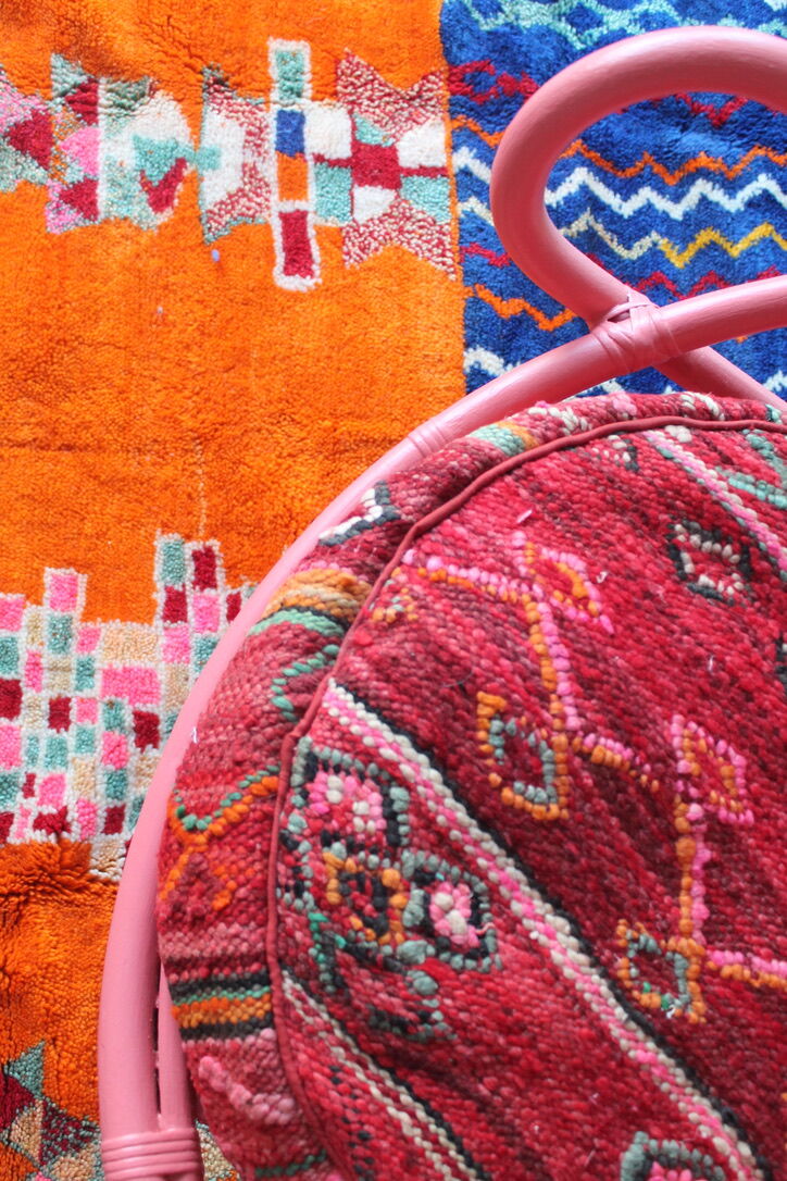 Restored vintage 70s armchair with custom-made Moroccan cushions, pink and red armchair