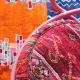 Restored vintage 70s armchair with custom-made Moroccan cushions, pink and red armchair