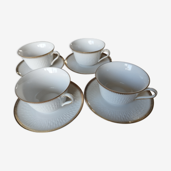 Set of 4 white porcelain tea cups