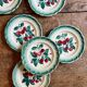 Set of 7 vintage Badonvilier dessert plates.
