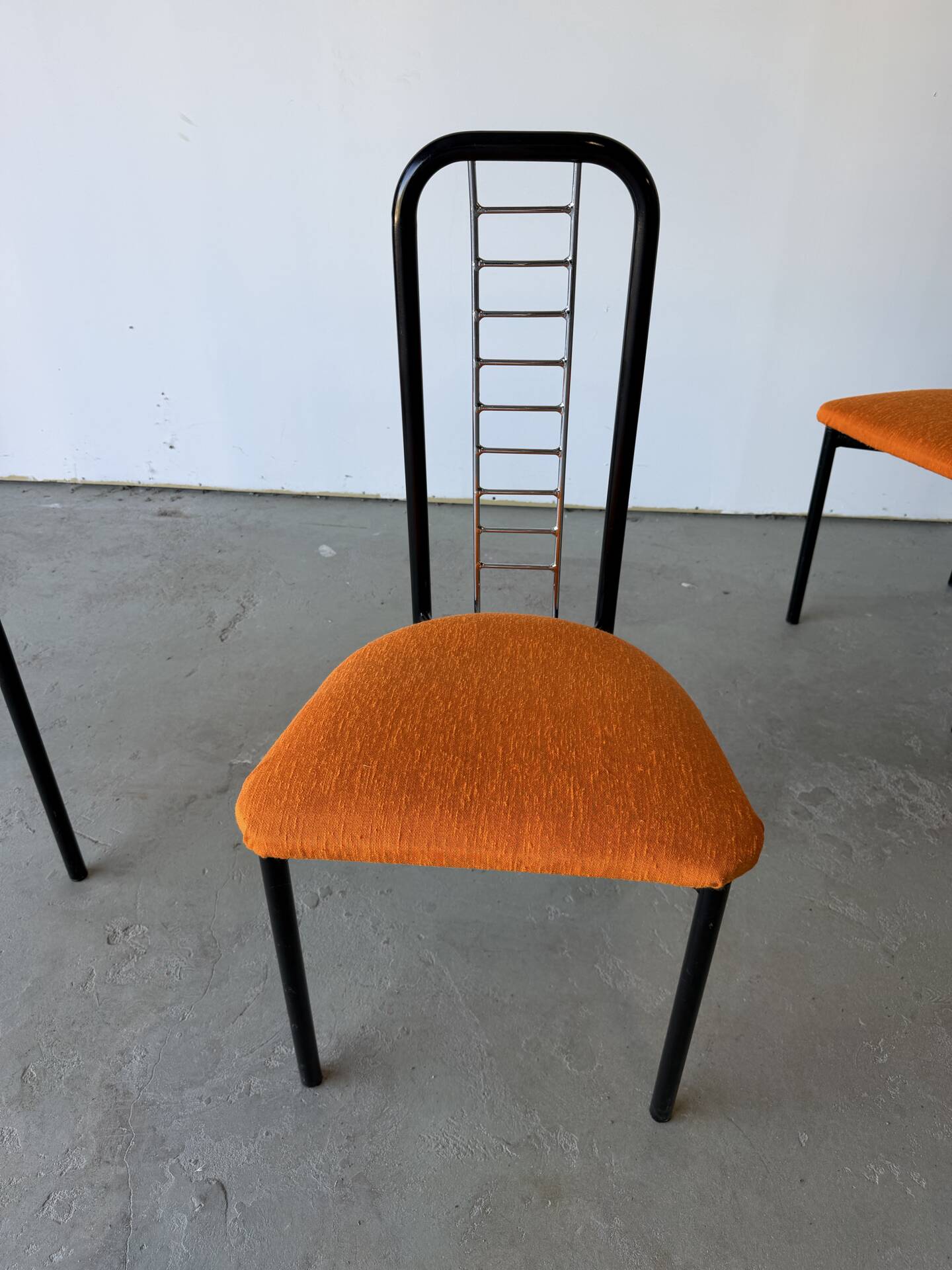 Set of 4 Italian design chairs in vintage black metal and chrome.
