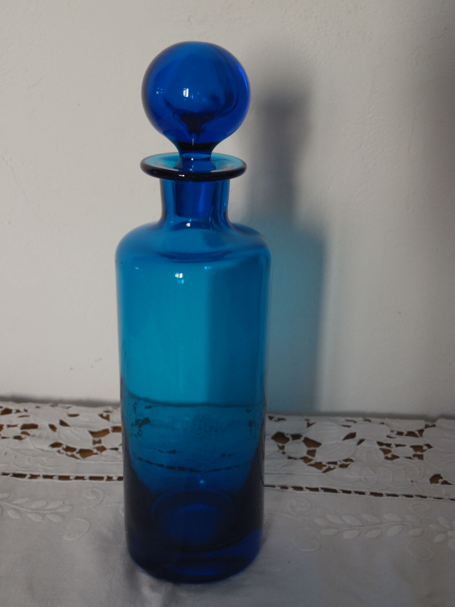 Glass bottle blue ball cap