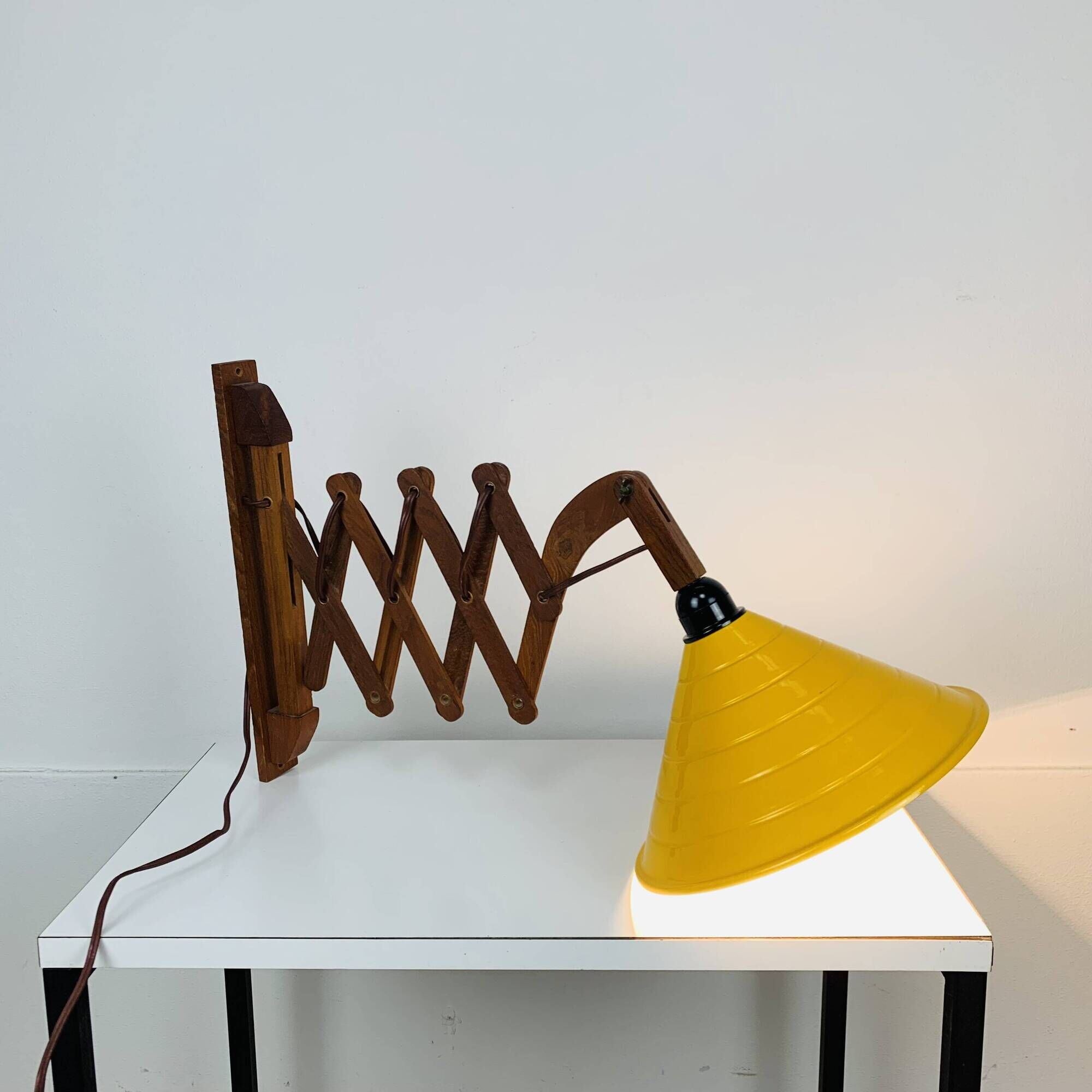 Scandinavian accordion wall light from the 60s, wood and yellow reflector