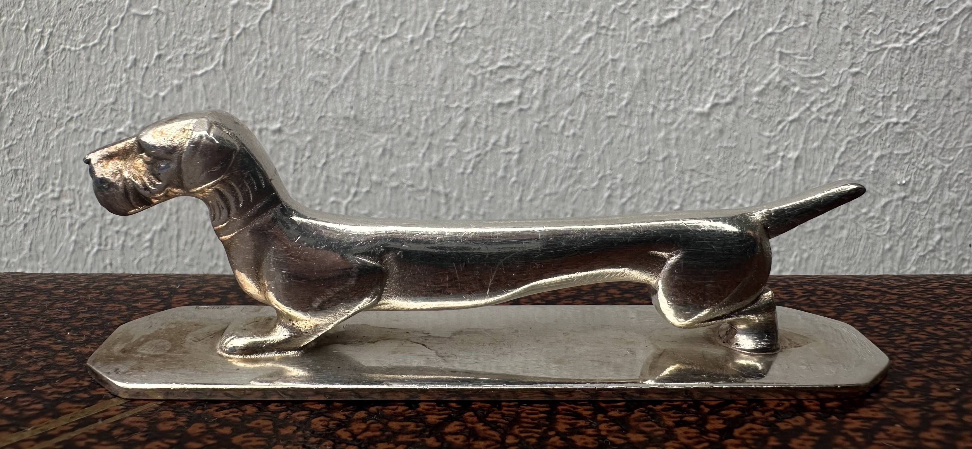 12 antique silver-plated bronze knife rests in modern art deco animal designs.