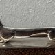12 antique silver-plated bronze knife rests in modern art deco animal designs.