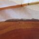 Tripod coffee table - solid okoumé wood - organic shape - brutalist style
