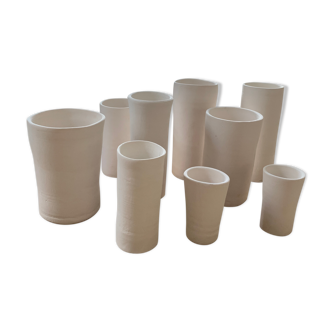 Lot of 9 craft porcelain vases