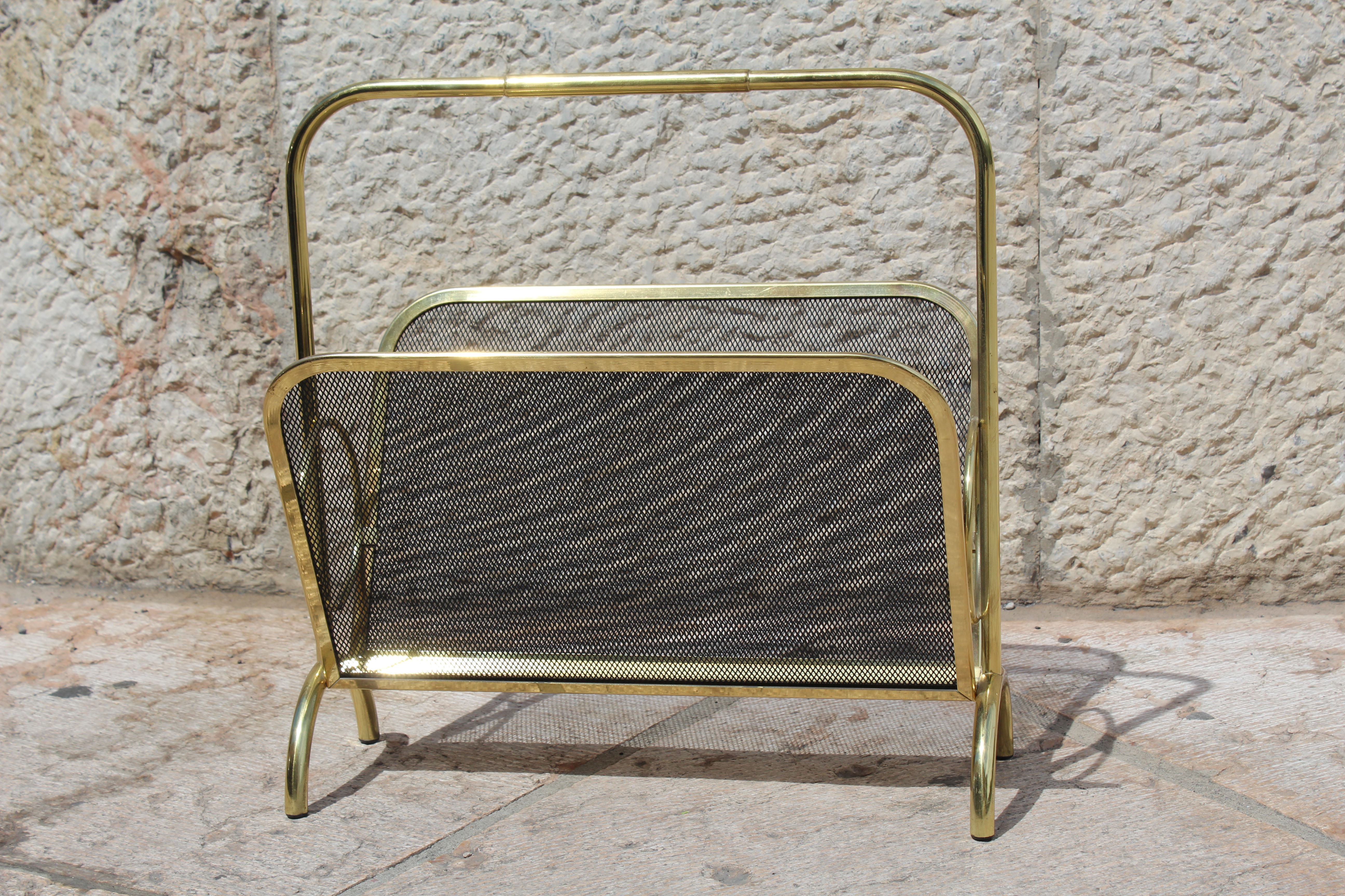 Magazine rack in brass and black lacquered metal, Italy 1970s