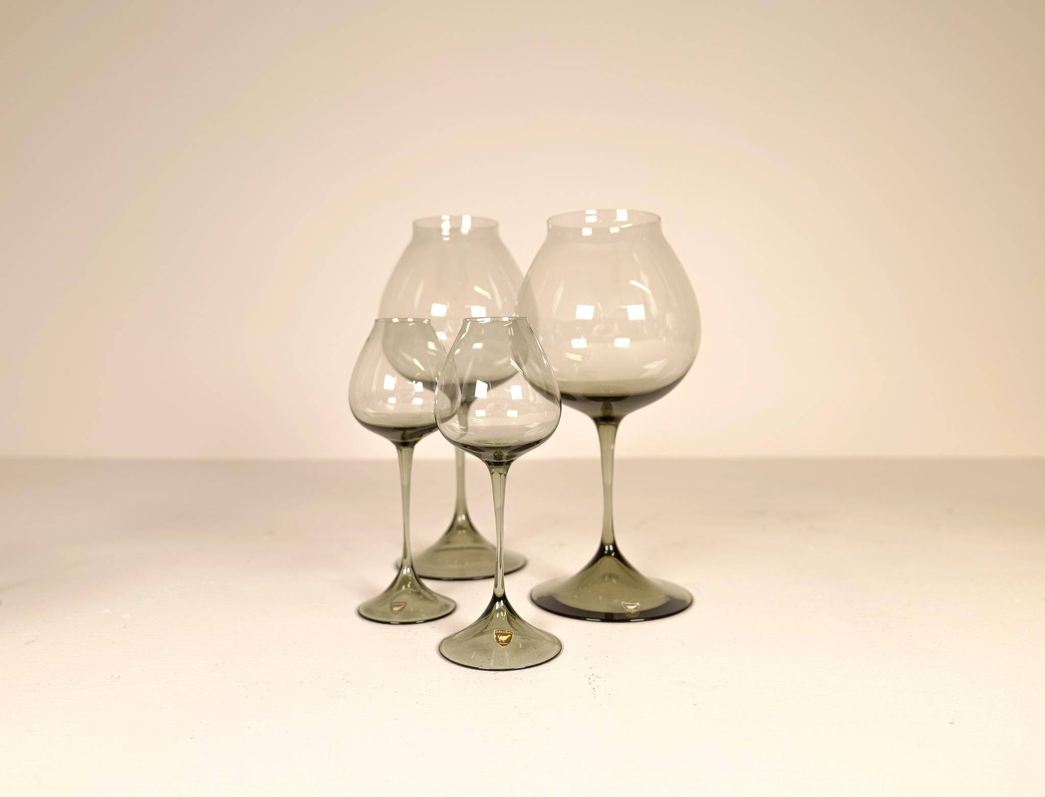 Large collection of Midcentury tulip glasses by Orrefors Nils Landberg, Sweden, 1950s.
