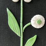 Ceramic flower mirror.
