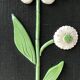 Ceramic flower mirror.