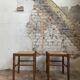 Pair of 20th century wooden stools with straw seats