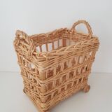 Vintage wicker basket on wheels - children's toy trolley