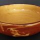 Glazed terracotta shallow dish from the 20th century.