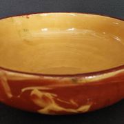 Plat creux terre cuite vernissée XXème