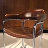 Pair of vintage armchairs, cognac leather and chrome steel 1970