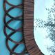 Oval mirror in rattan