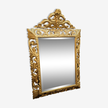 Miroir italien en bois sculpté et doré