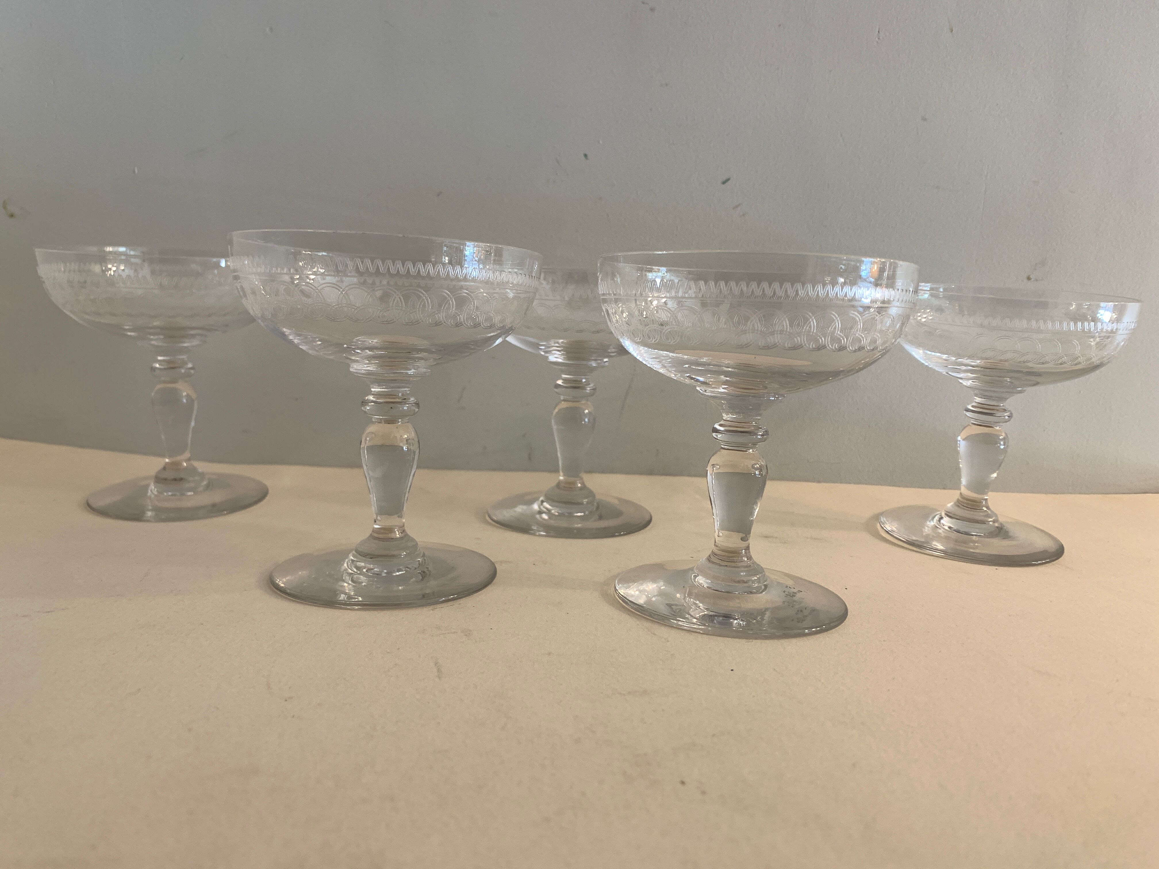 5 antique champagne glasses in engraved crystal