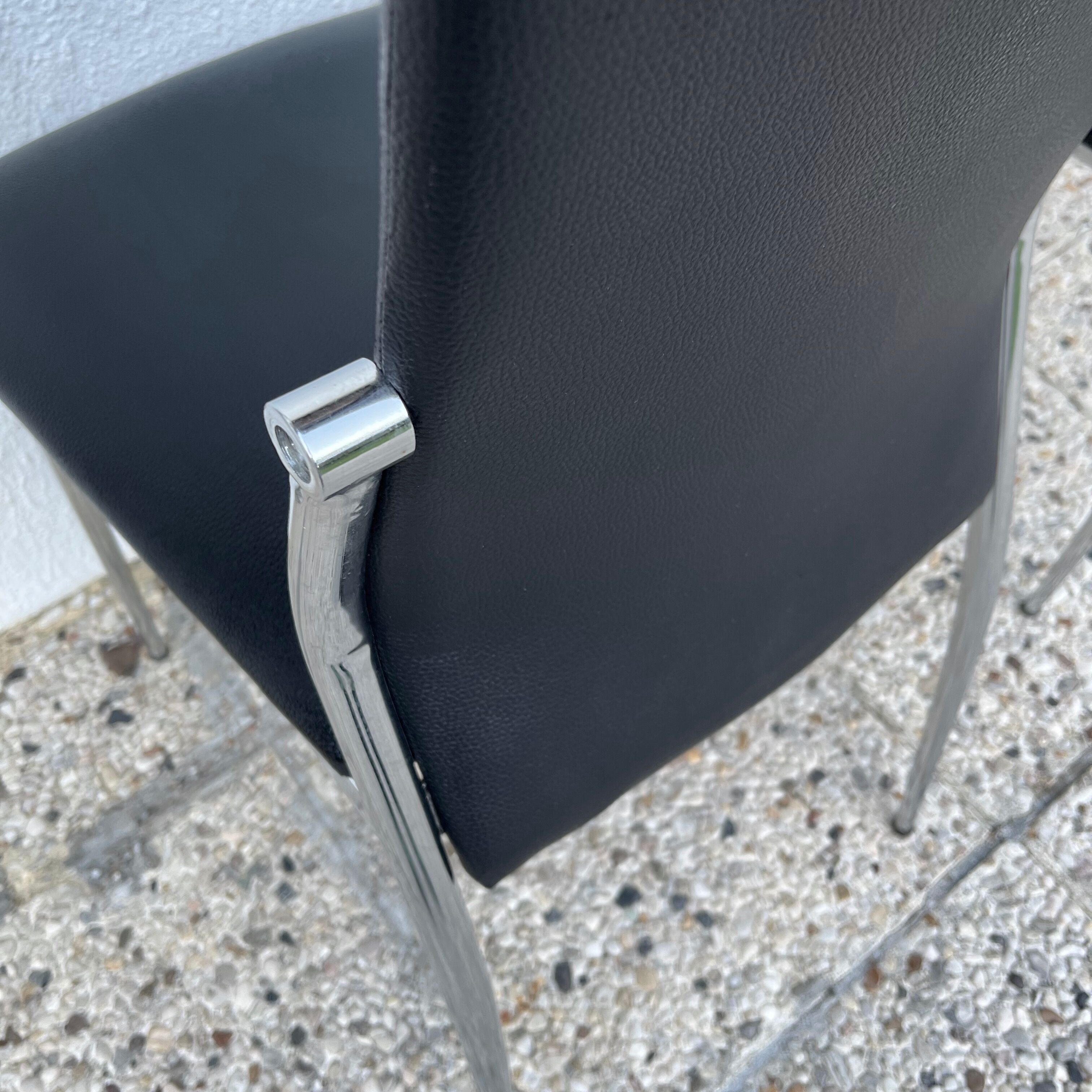 Design chair in black skaï