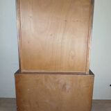 Art Deco period bookcase in lacquered wood with a faux appearance of rust-patinated sheet metal circa 1930-1940