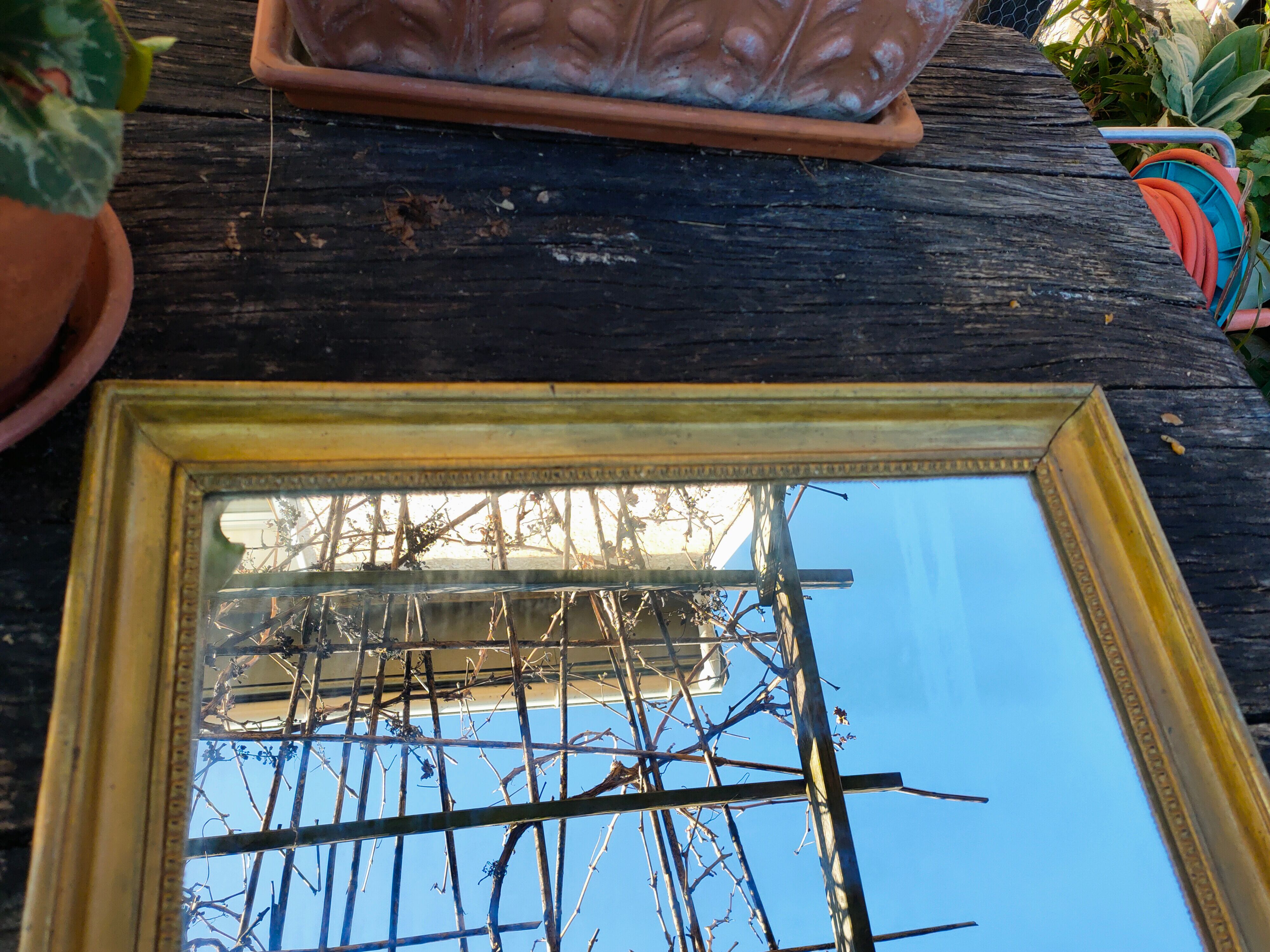 Rustic golden mirror