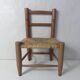 Old wooden straw chair for children