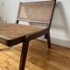 Vintage wooden and cane armchair