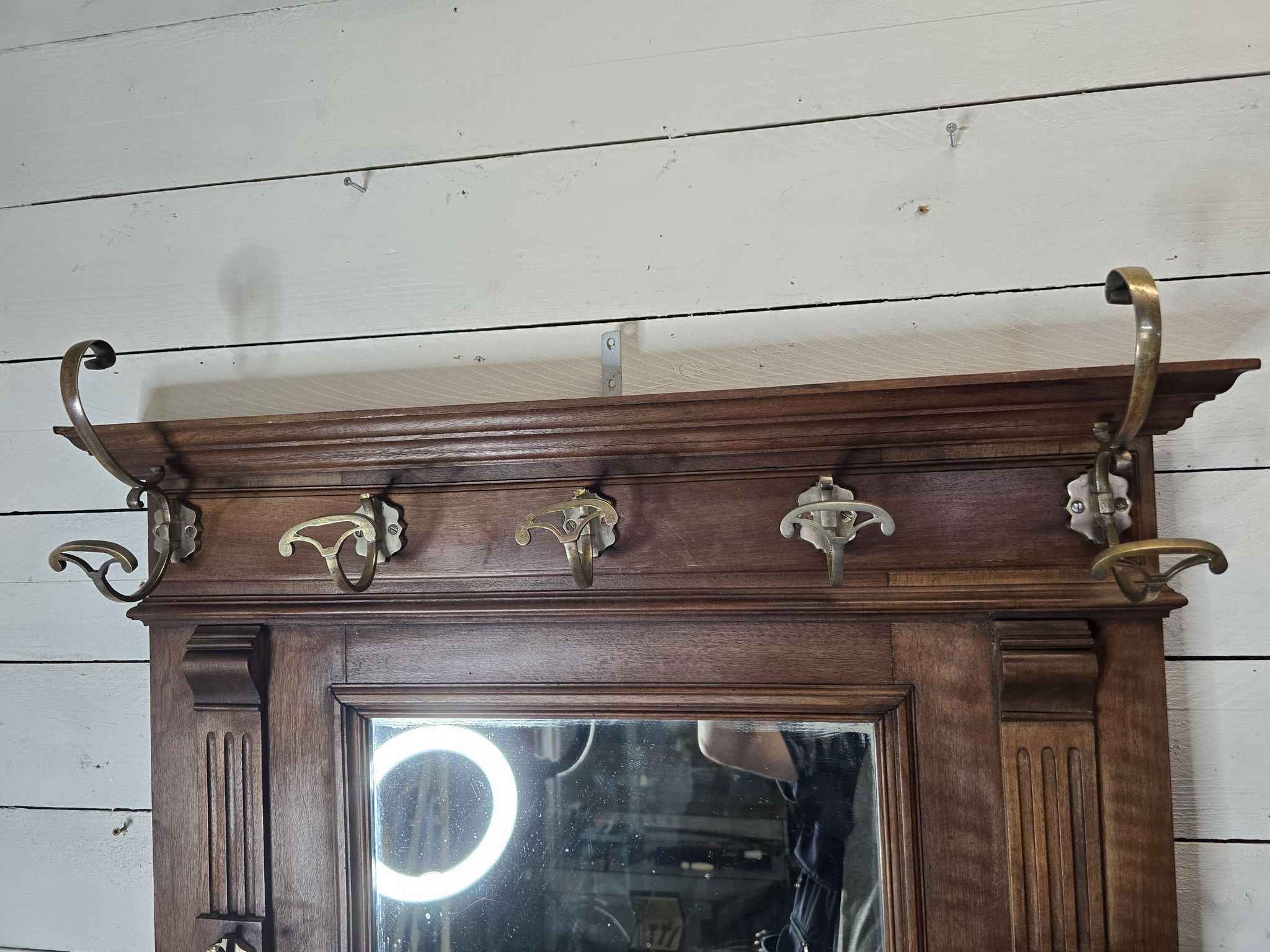 Old locker room or coat rack in walnut