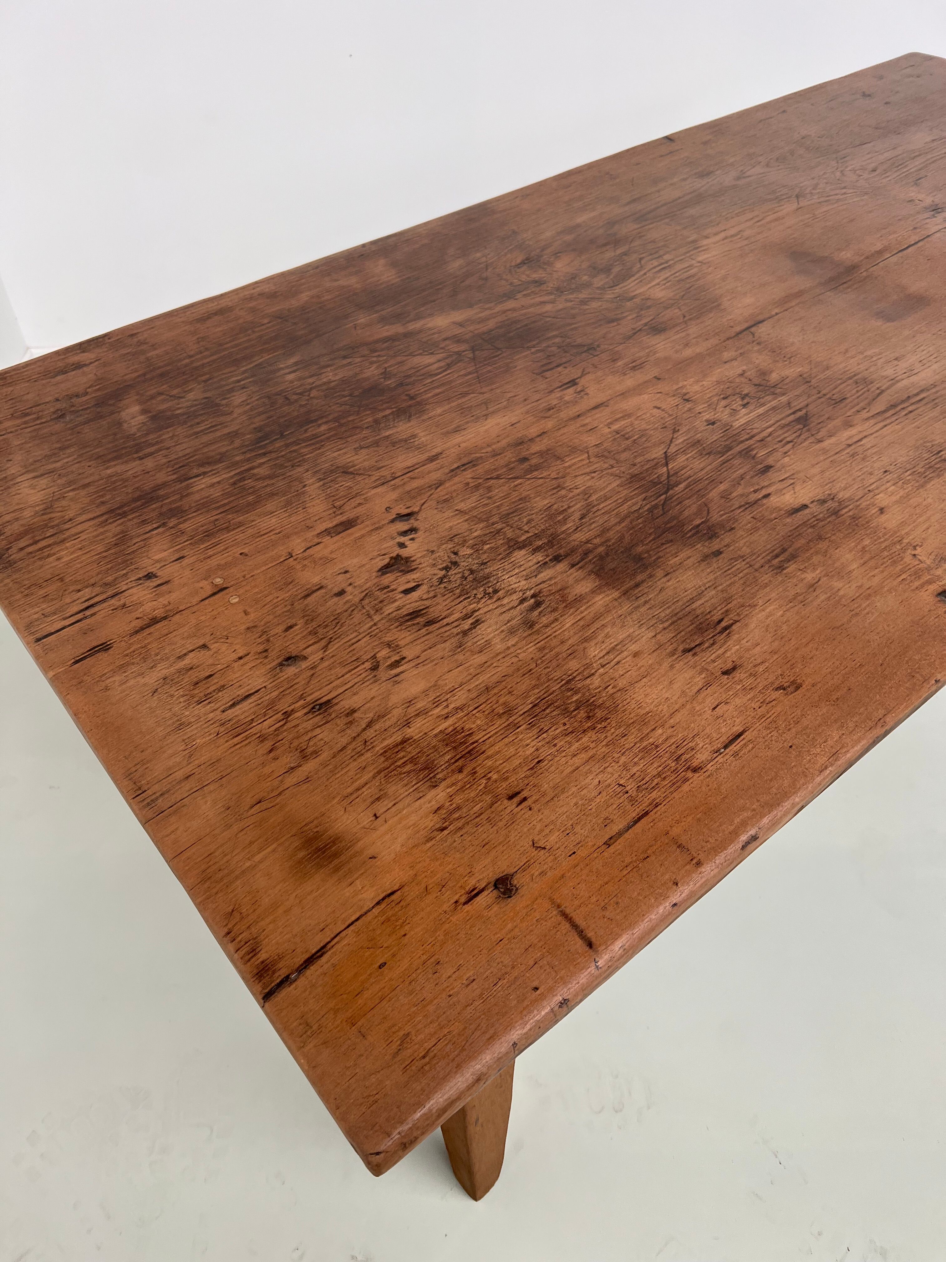 Teak dining table with spindle legs, 50s