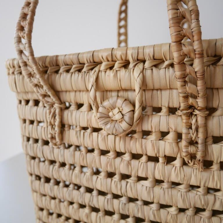 Basket made of woven palm leaves