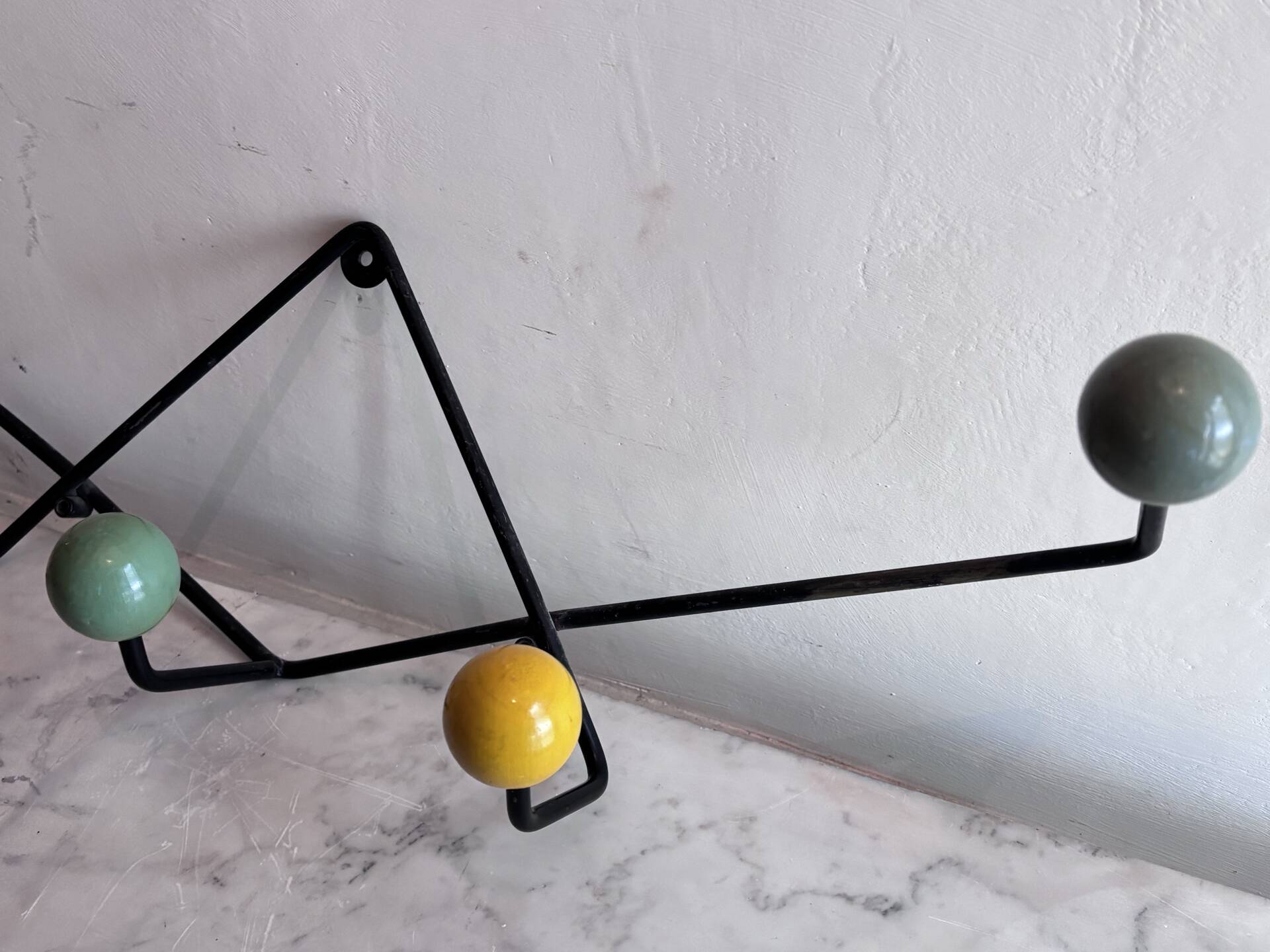 Wall coat rack Roger Feraud, metal and wooden balls.