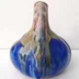 Vintage decanter in enamelled earthenware
