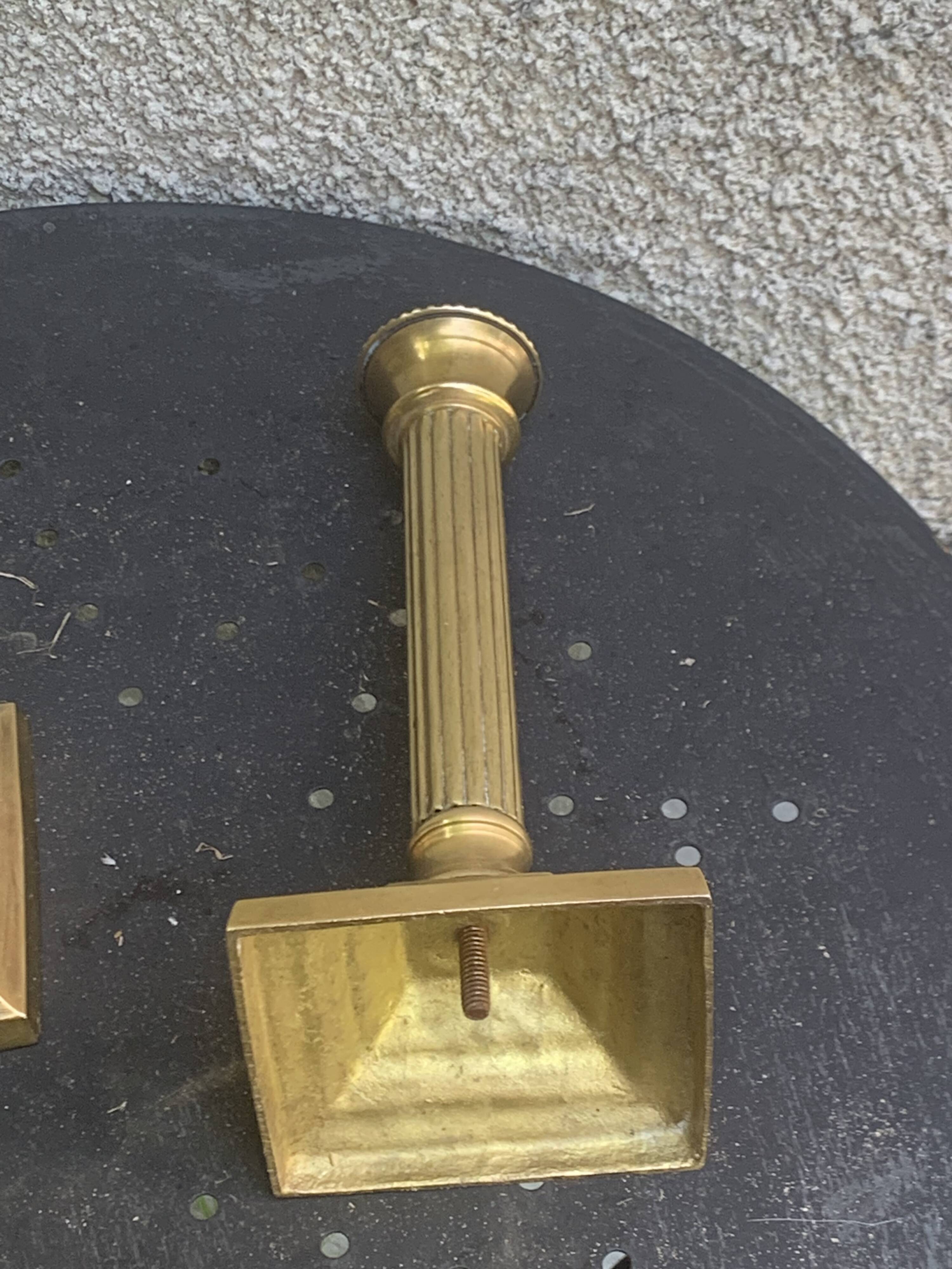 Pair of gilded brass candlesticks, vintage column shape